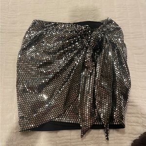 - Zara sequence mini skirt with a tie on the side.